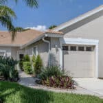 Beautiful residential property showcasing modern design and tropical greenery.