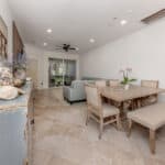 Interior view of a spacious, bright home with stylish decor and comfortable seating.