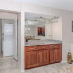 Home interior with kitchen and laundry area at 345 Three Lakes Lane.