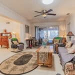 Living room with comfortable seating and tropical views in Port Charlotte.
