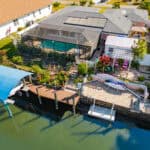 Beautiful waterfront property featuring a swimming pool and boat dock in Port Charlotte. Perfect for.